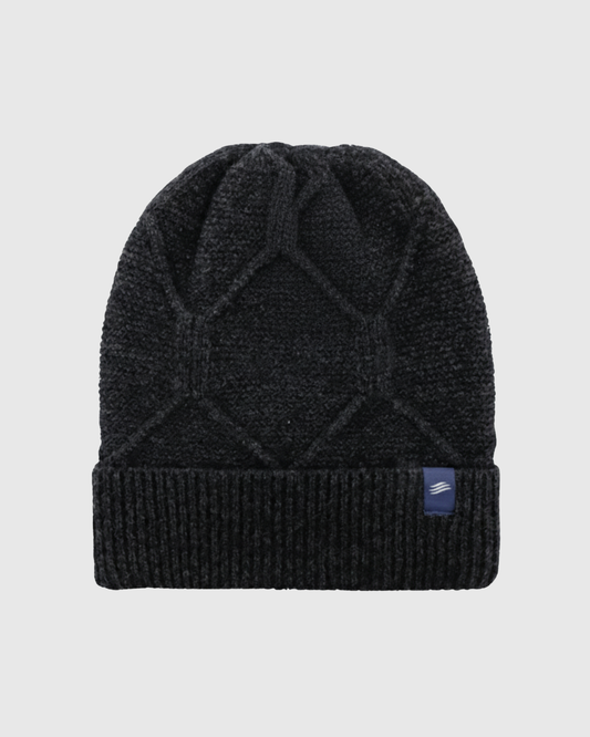 Charcoal Gray Yak Cable Knit Beanie (Front): Dark charcoal knit beanie with geometric cable pattern and ribbed cuff, small blue label