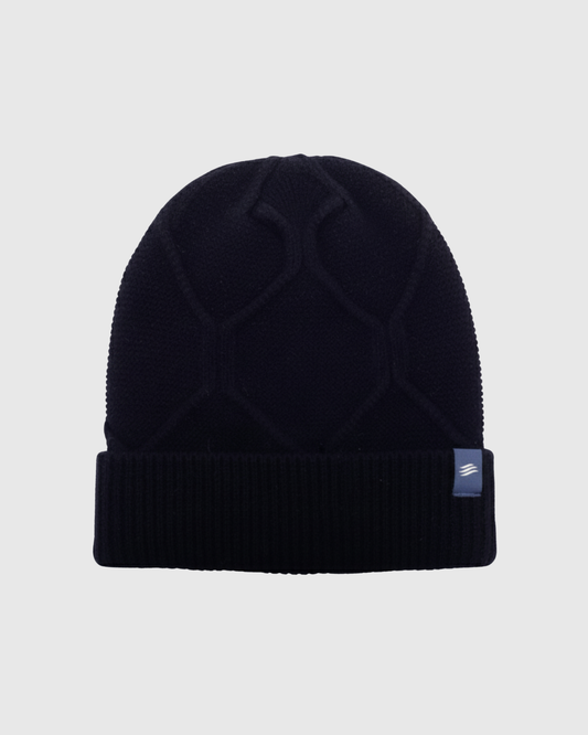 Navy Yak Cable Knit Beanie (Front): Dark navy knit beanie with cable pattern and ribbed cuff, small logo patch