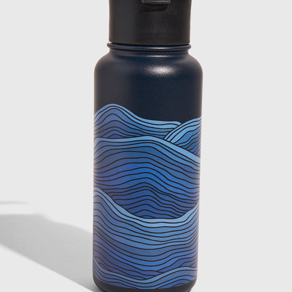 Lake - Waves Bottle - 23 Oz. Insulated Stainless Steel (Front): Dark navy bottle with blue wave pattern and black flip-top lid