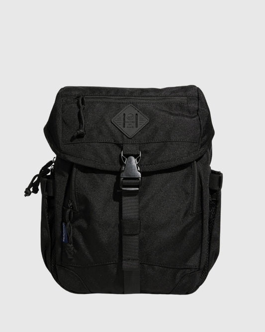 Black (R)evolution™ 9L Sidekick (Front): Black compact backpack with flap closure, buckle strap, and side mesh pocket
