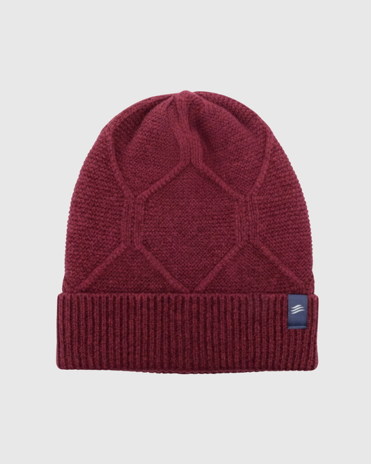 Berry Yak Cable Knit Beanie (Flat-lay): Deep red knit beanie with geometric diamond pattern and ribbed cuff