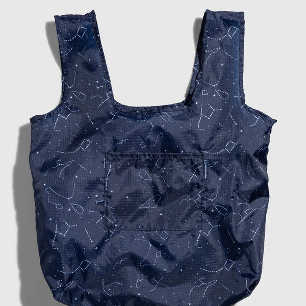 Night Sky The Packable Tote (Front): Navy blue tote with white constellation print and front patch pocket