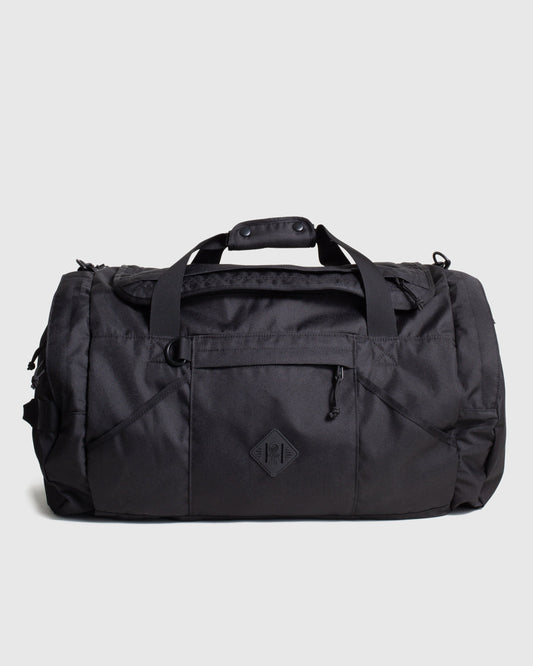 Black (R)evolution™ 55L Carry-On Duffle (Front): Black duffel bag with top handles, front zip pocket, and diamond logo patch