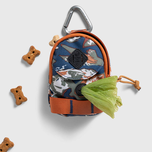 Lakeside Camo (R)evolution™ Dog Waste Bag Dispenser (Flat-lay): Blue camo mini backpack dispenser with carabiner clip and green waste bag