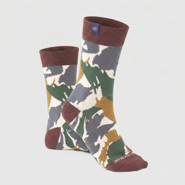 Mahogany IMPACT COLLECTION - Hemp Blend Socks (Angle): Crew socks with camouflage print in grey, green, gold, and cream, dark red cuffs, heel, and toe