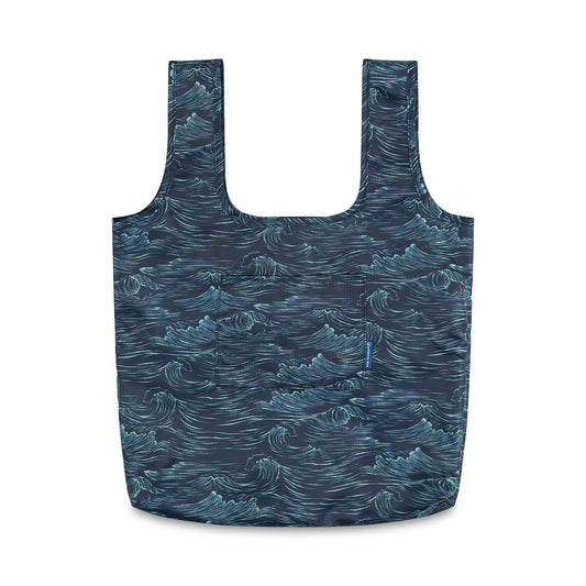 Waves The Packable Tote (Front): Navy tote with teal wave print, two straps, front pocket
