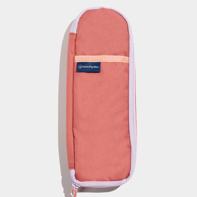 Mauve The Utensil Pack - Perfect for Packed Lunches (Flat-lay): Coral canvas pouch with lavender zipper trim, peach strap, and navy logo patch