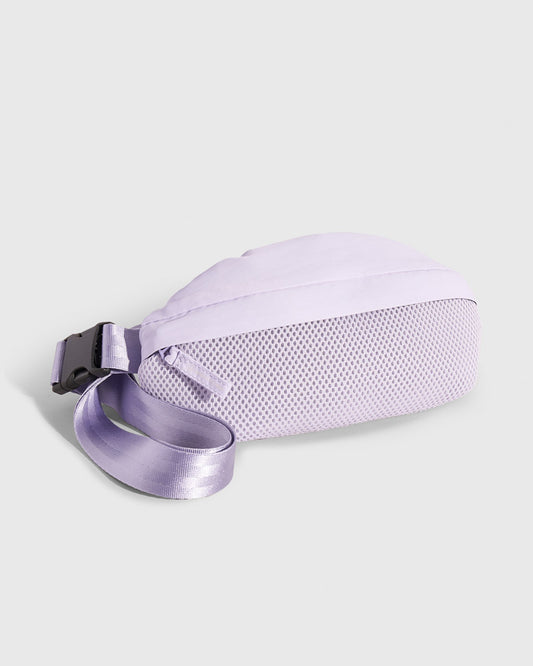 Lavender (Re)active™ 1L Fanny Pack (Angle): Lavender fanny pack showing mesh bottom panel and adjustable buckle strap