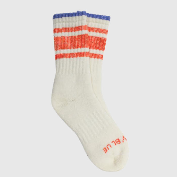Off White The Hemp Yarn Varsity Hiker Full Cushion Boot Sock (Angle): Crew sock with red stripes, blue cuff, and brand text on sole