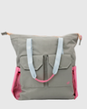 Lt Gray (R)evolution™ 27L Utility Convertible Tote (Front): Gray tote with light blue straps, pink accents, and dual front pockets