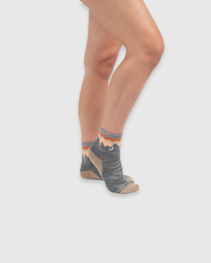 Merino Wool - Quarter Sock - New Color (In-use): Grey mountain-pattern merino quarter socks worn on feet, side view