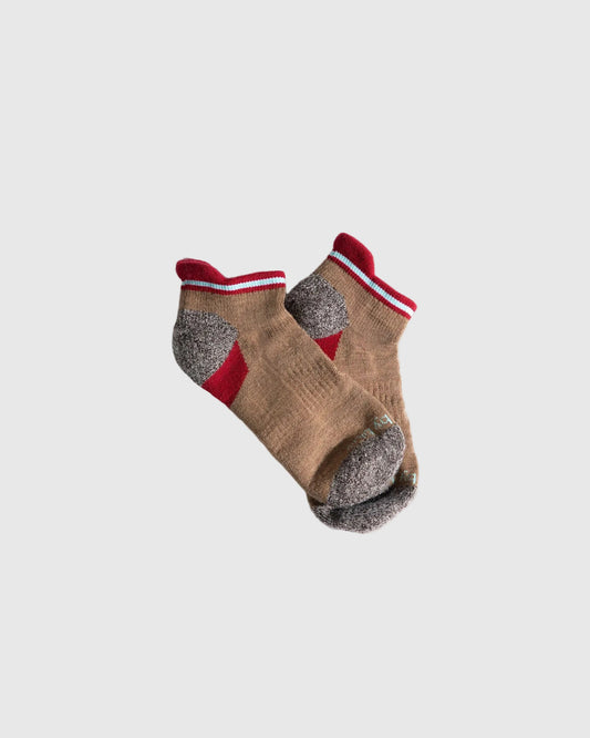 Camel Stripe Merino Wool - Low Cut Sock (Angle): Tan ankle socks with grey heel and toe, red and light blue striped cuff