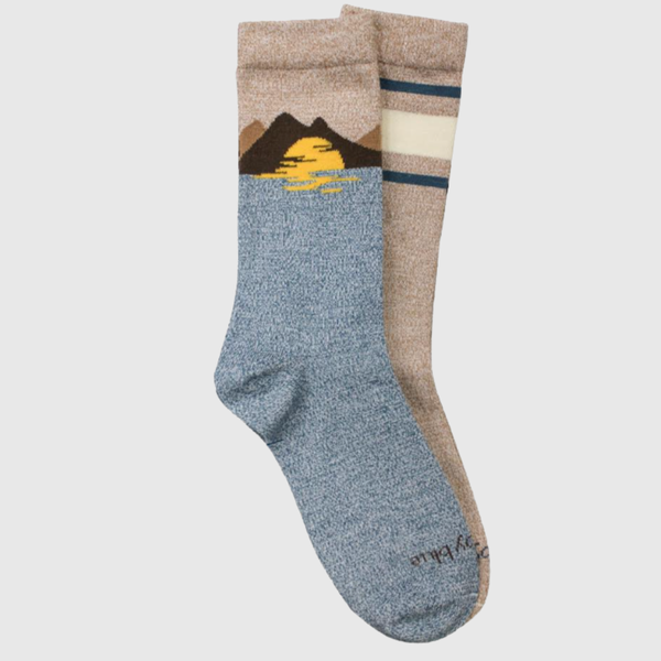 S/M The Soft Hemp Mountain Crew Sock - 2 Pack (Angle): Two mismatched crew socks, blue with mountain sunset print, tan with stripes