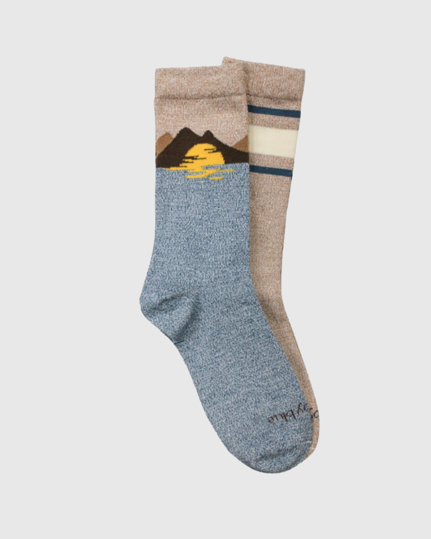 S/M The Soft Hemp Mountain Crew Sock - 2 Pack (Angle): Two mismatched crew socks: blue with mountain sunset print, tan with stripes