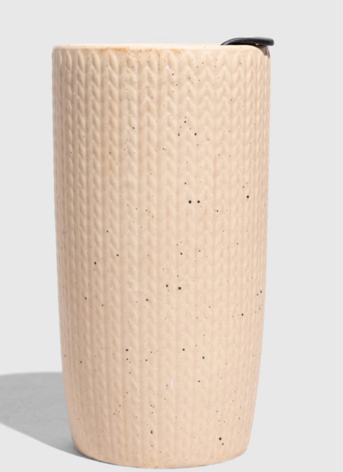 Shortbread-Knit 10 oz. Insulated Stoneware Travel Mug (Front): Cream speckled cylindrical mug with knit texture embossing and black lid clip