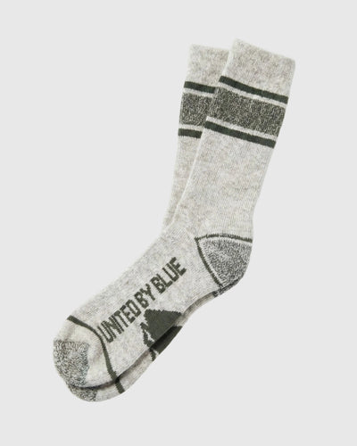 Wild Green Ultimate Bison Boot Sock - Imperfect Packaging (Angle): Light gray crew sock with dark green stripes, reinforced heel and toe