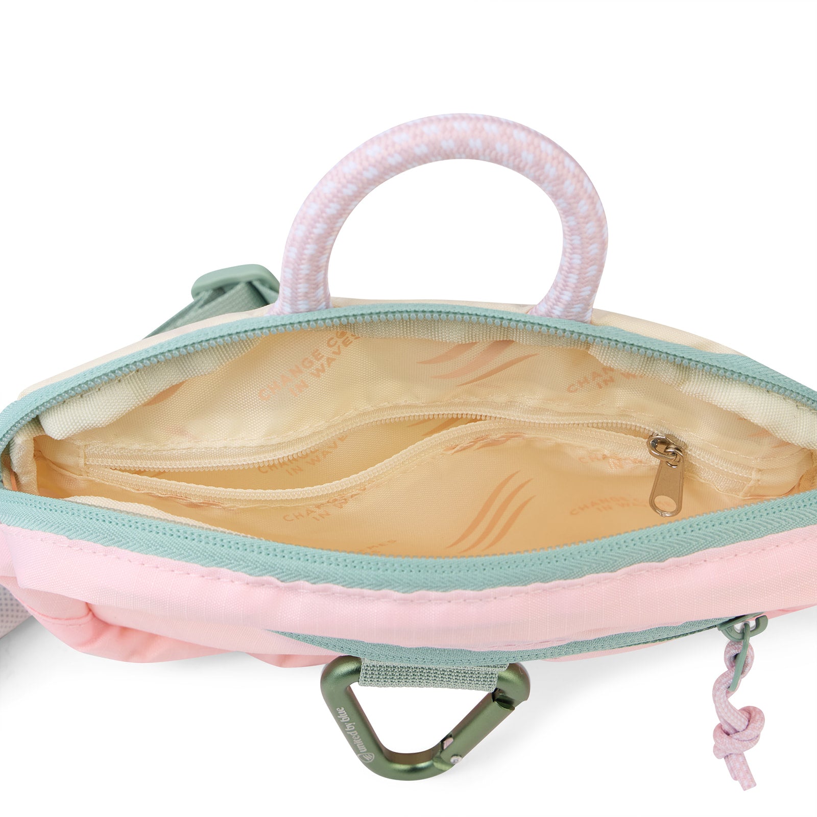 Lt. Pink (Re) Active Bum Bag (Interior): Open bum bag showing tan printed lining, interior zip pocket, and mint rope handle