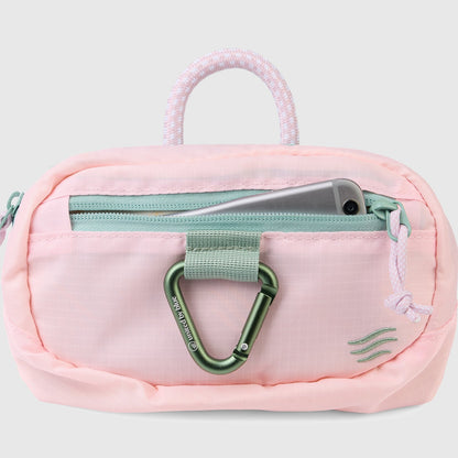 Lt. Pink (Re) Active Bum Bag (Detail): Front zip pocket open with phone inside, mint zipper, and green carabiner clip
