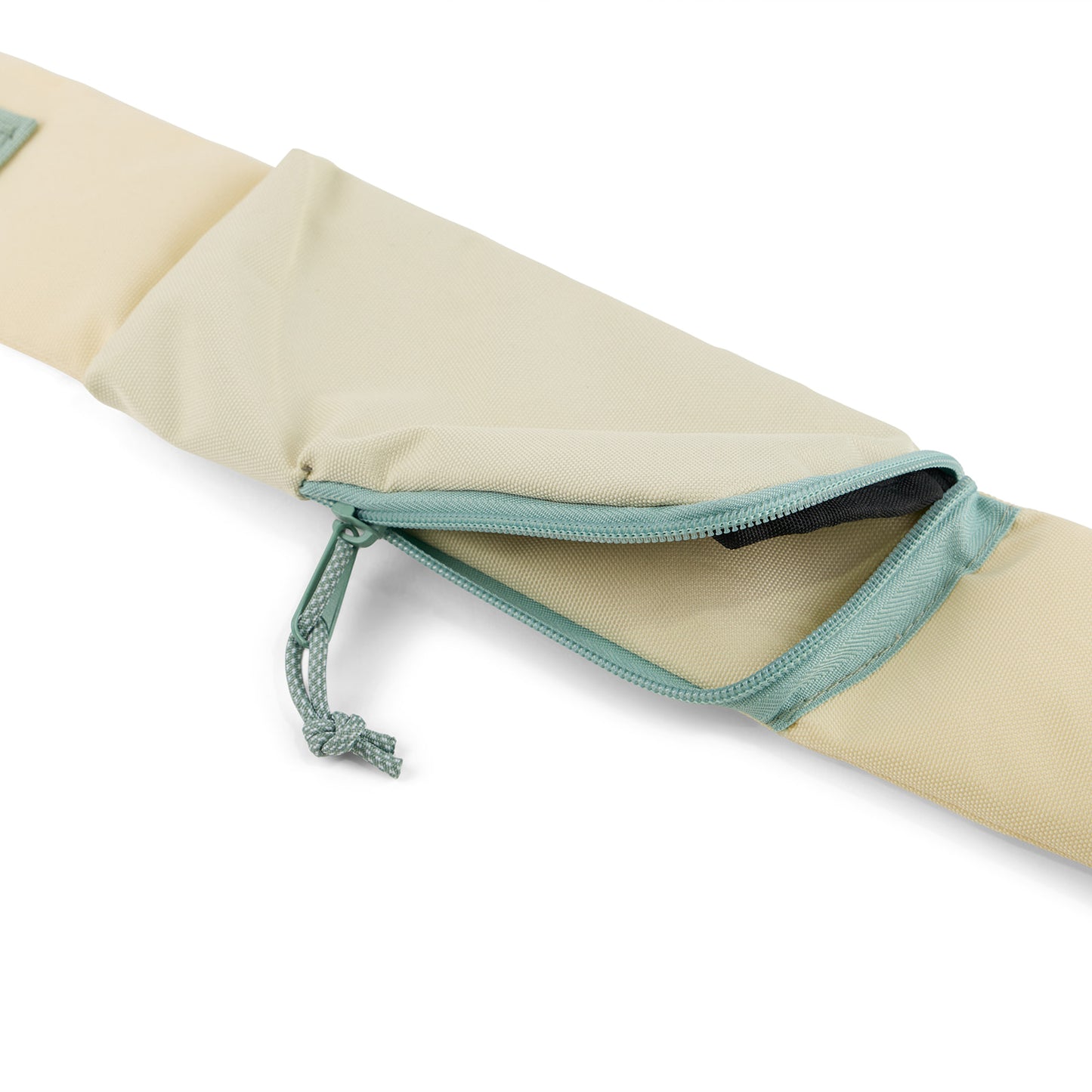 Pink Multi (R)evolution Sling Pack (Detail): Close-up of cream strap pocket with mint zipper and hidden zip stash compartment