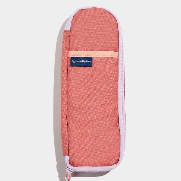 Mauve The Utensil Pack - Perfect for Packed Lunches (Flat-lay): Coral canvas pouch with lavender zipper trim, small front pocket, logo patch