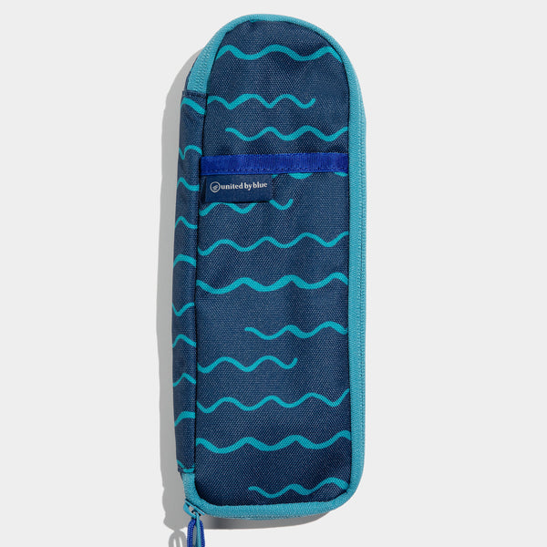 Navy - Geo Waves The Utensil Pack - Perfect for Packed Lunches (Front): Navy pouch with teal wave print, blue zipper pull, and brand label