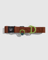 Terracotta (R)evolution™ Recycled Woven Dog Collar (Flat-lay): Brown nylon collar with black buckle, green D-ring, and adjustment slider