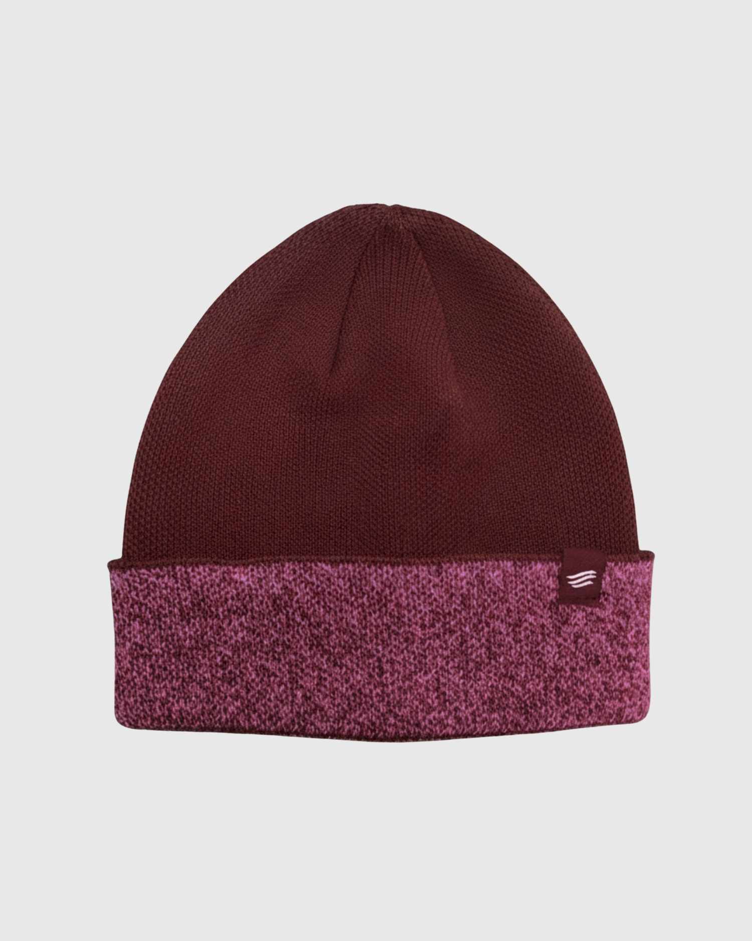 Burgundy The Essential Merino Marled Beanie (Front): Dark red knit beanie with marled pink folded cuff and small logo patch