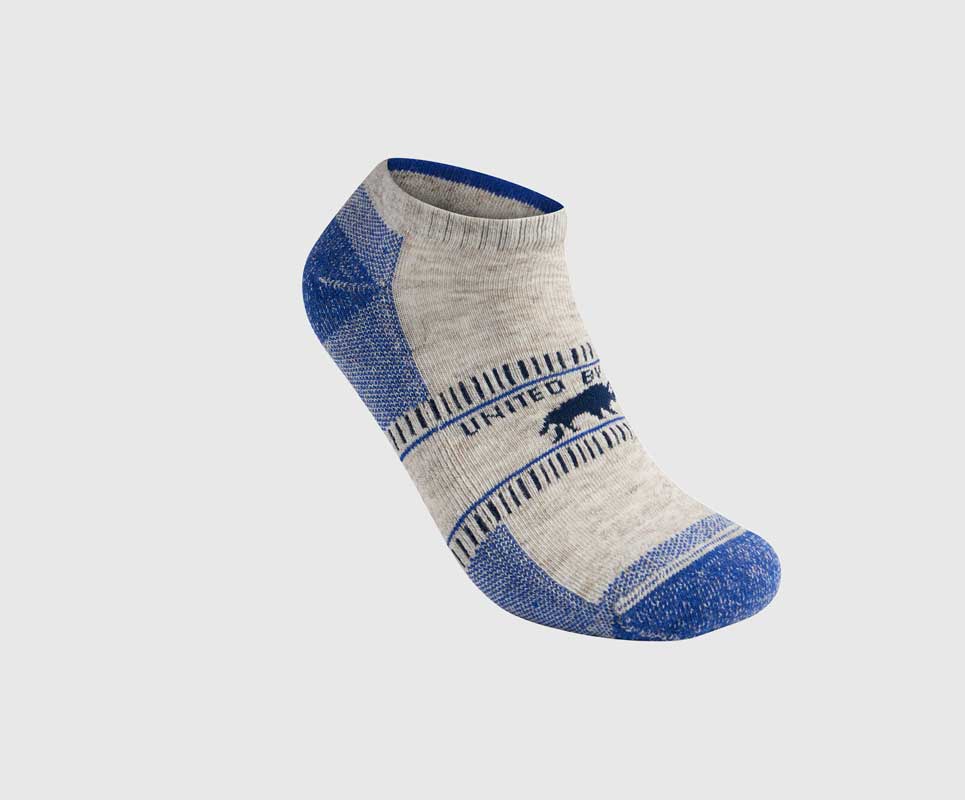 Blue Bison Trail Low-Cut Sock (Angle): Low-cut ankle sock, gray body, blue heel, toe, and cuff accent
