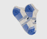 Blue Bison Trail Low-Cut Sock (Flat-lay): Two low-cut ankle socks, gray with blue heel, toe, and stripe accents