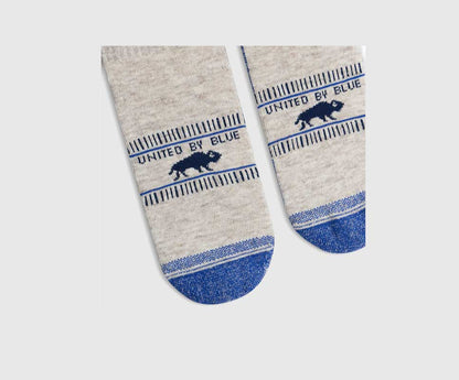 Blue Bison Trail Low-Cut Sock (Detail): Oatmeal heather socks with blue toe, bison graphic, and brand text