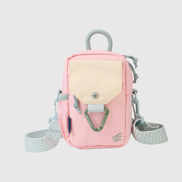 Lt Pink (R)evolution Daily Cross Body (Front): Pink crossbody bag with cream snap-flap pocket, green carabiner, rope handle, and chevron strap