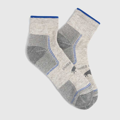Grey Bison Trail Quarter Sock (Flat-lay): Pair of light grey quarter socks with blue trim and bison logo