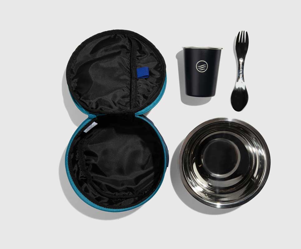 Navy The Meal Kit (Single) (Flat-lay): Open navy zip case beside stainless bowl, dark cup, and spork utensil
