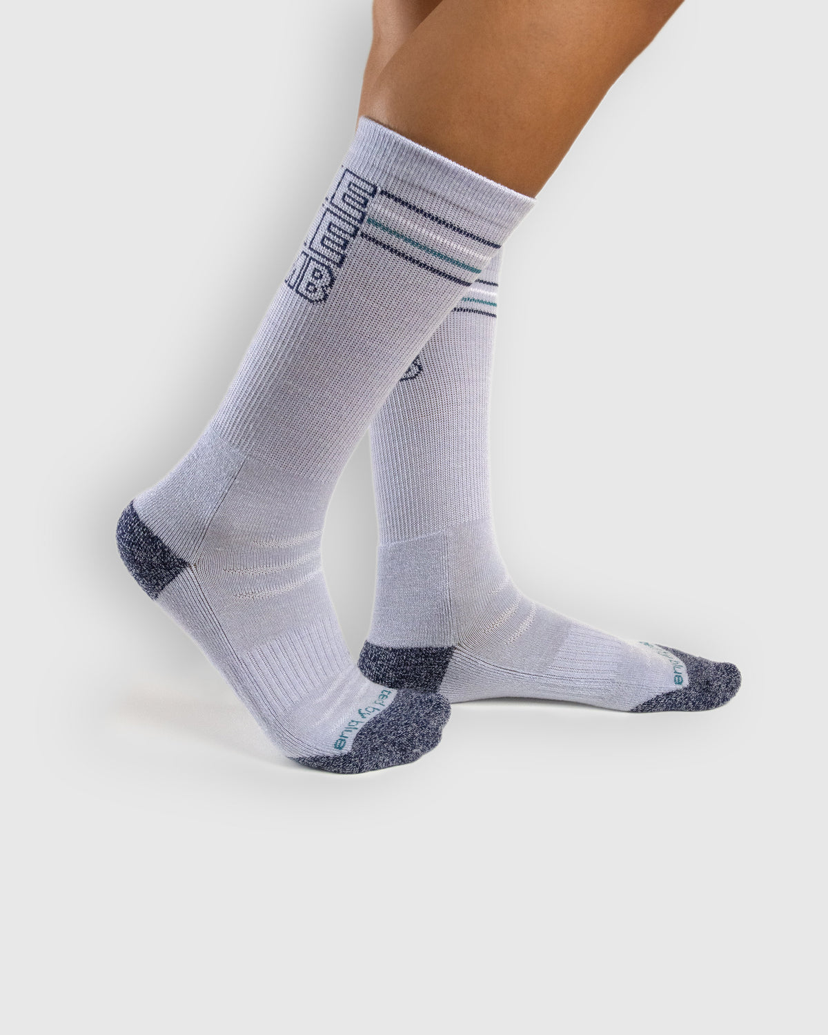 HikeBikeClimb - Periwinkle Merino Wool - Graphic Crew Sock (In-use): Periwinkle graphic merino crew socks worn on feet, side view