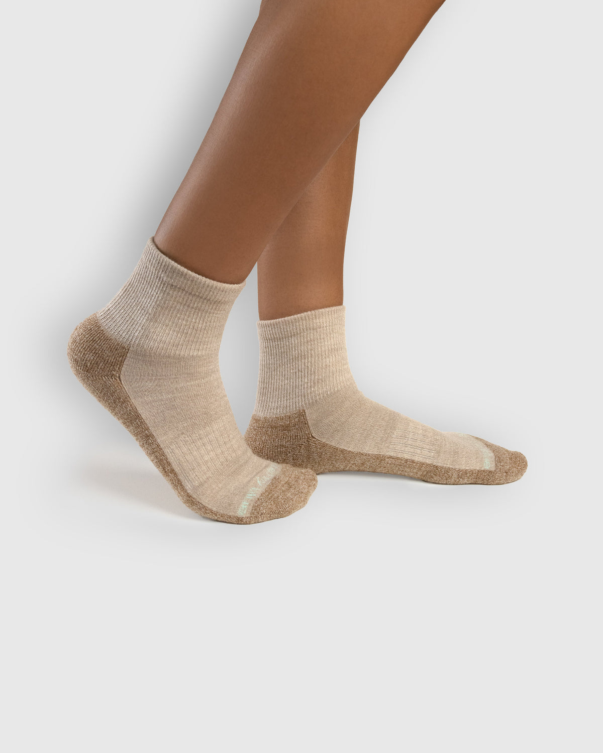 Classic Beige Marled Merino Wool - Marled Quarter Sock (In-use): Beige marled merino quarter socks worn on feet, side view