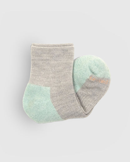 Stone Marled Merino Wool - Marled Quarter Sock (Detail): Folded grey quarter sock showing ribbed cuff and mint green sole