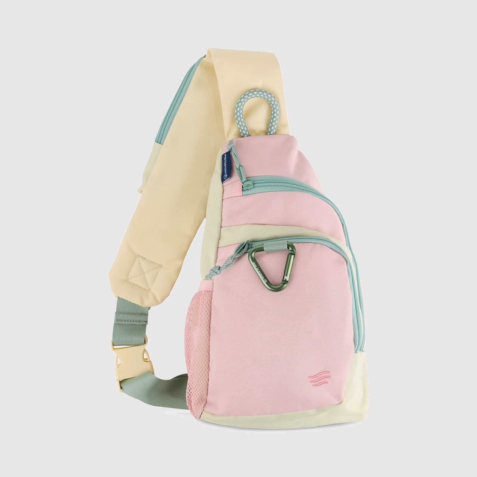 Pink Multi (R)evolution Sling Pack (Side): Pink and cream sling pack showing strap, mesh water bottle pocket, and carabiner
