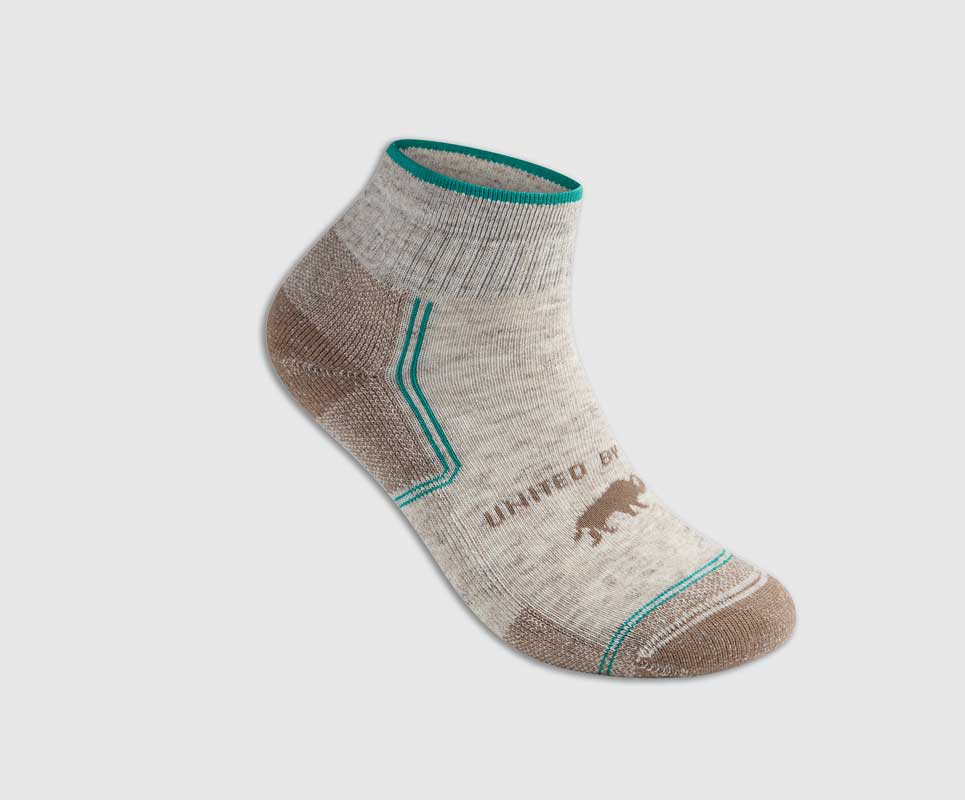 Taupe Bison Trail Quarter Sock (Angle): Low-cut ankle sock with teal trim, brown heel, bison graphic