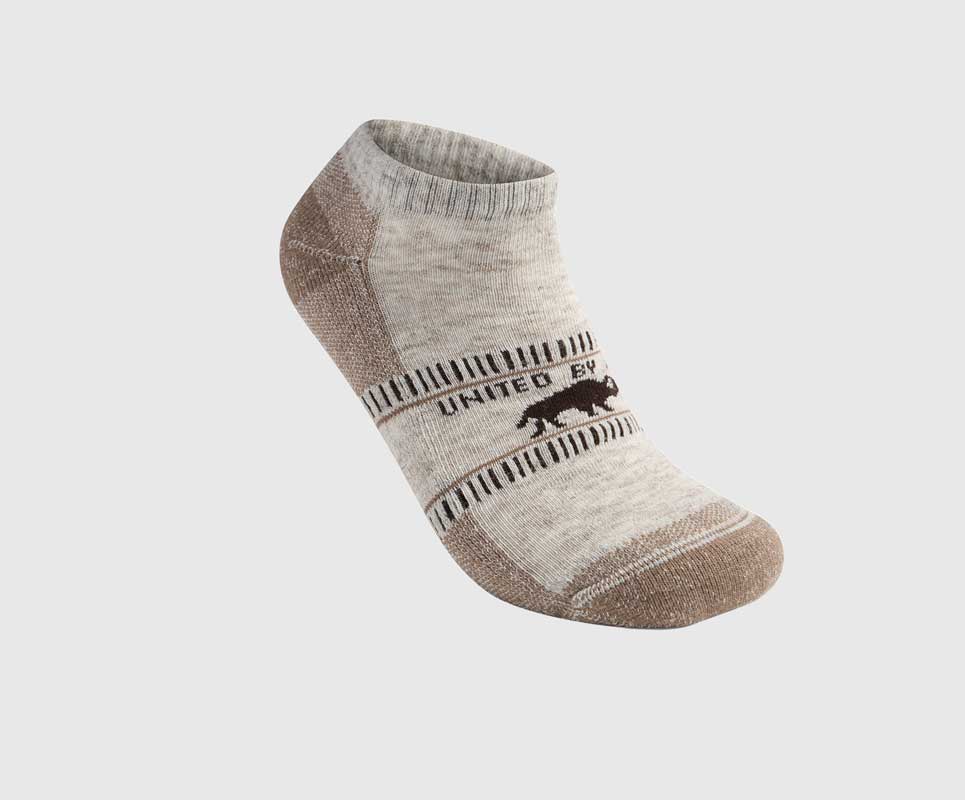 Taupe Bison Trail Low-Cut Sock (Angle): Light gray low-cut ankle sock with tan heel, toe, and bison logo