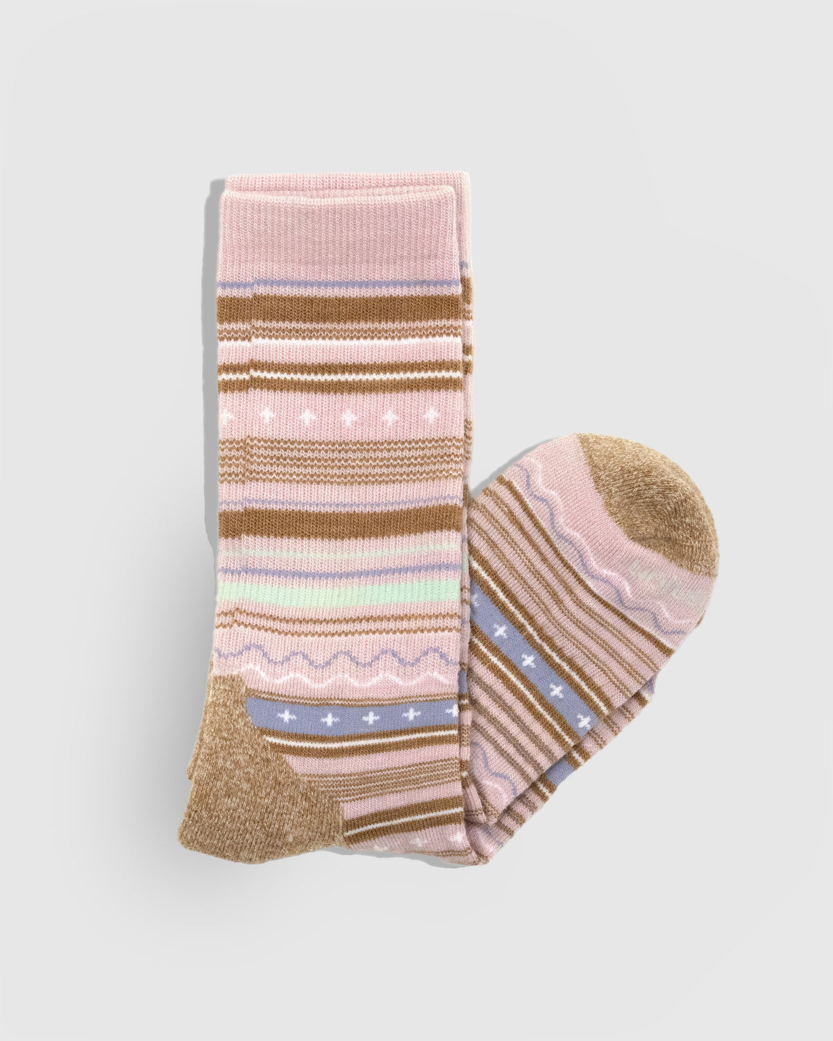 Pink Frost Merino Wool Trail Crew Sock - New Color (Detail): Folded pink striped crew sock showing patterned cuff and camel toe