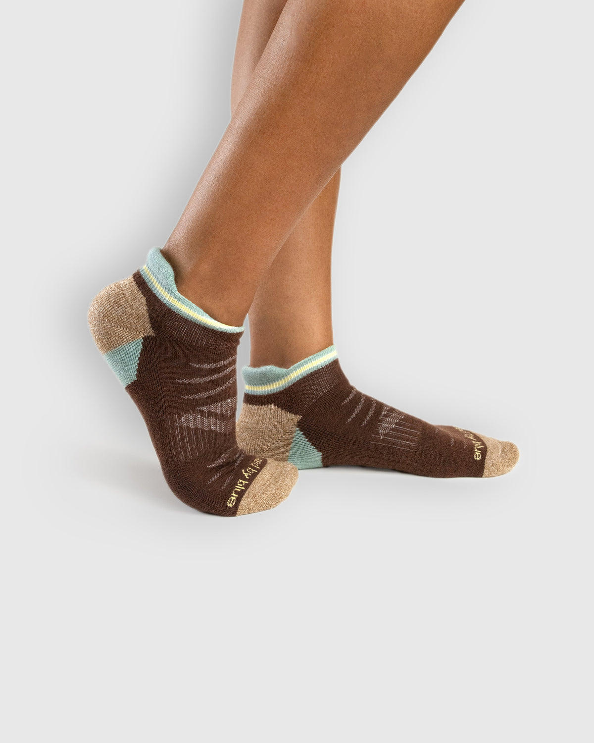 Cocoa Merino Wool - Low Cut Sock (In-use): Brown and mint merino low-cut socks worn on feet, side view