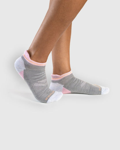 Hthr Grey Merino Wool - Low Cut Sock (In-use): Grey and pink merino low-cut socks worn on feet, side view
