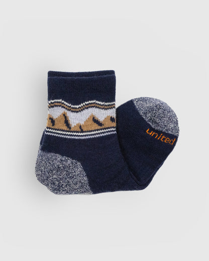 Midnight Merino Wool - Quarter Sock - New Color (Detail): Folded navy quarter sock showing mountain pattern cuff and marled grey toe