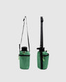 Evergreen Water Bottle Sling - Westward (Pre-Release) (Angle): Two green bottle carriers shown with thin strap and wide strap configurations