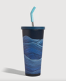 Lake- Waves 24 oz Insulated Steel Straw Tumbler (Angle): Dark navy tumbler with blue wave print, teal lid and bent straw