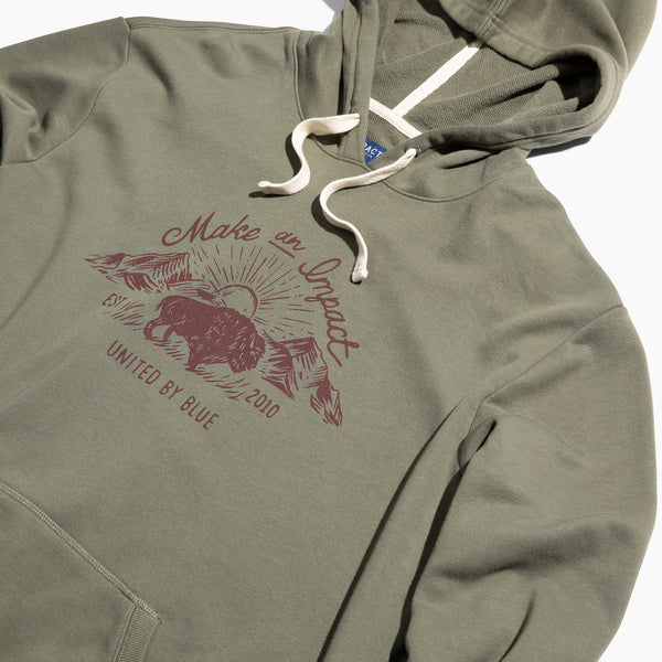 Dark Olive Bison Impact Hoodie (Detail): Olive pullover hoodie with maroon bison graphic print and cream drawstrings