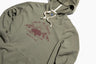 Dark Olive Bison Impact Hoodie (Detail): Olive hoodie with maroon bison graphic, cream drawstrings, kangaroo pocket visible