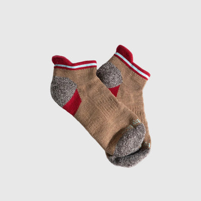 Camel Stripe Merino Wool - Low Cut Sock (Angle): Tan ankle socks with grey heel and toe, red and light blue striped cuff