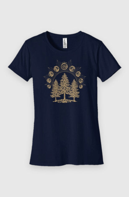 navy Womens Fit Graphic Tee in 100% Organic Cotton - Lunar Phases (Front): Fitted navy tee with gold pine trees beneath an arc of moon phases