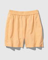 Buff Orange Recycled Sport Short (Flat-lay): Peach-orange elastic-waist shorts laid flat, slight side vents visible